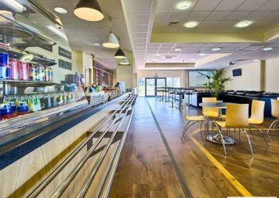 54d35f5723dc8ad653056f32_food_servery_counter_at_norwich_family_golf_centre